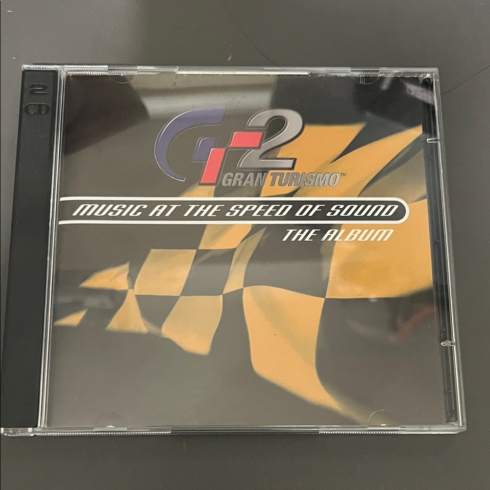 Ultra Rare Sony Gran Turismo 2 Album CD - plus Gran Turismo demo disc. RARE!